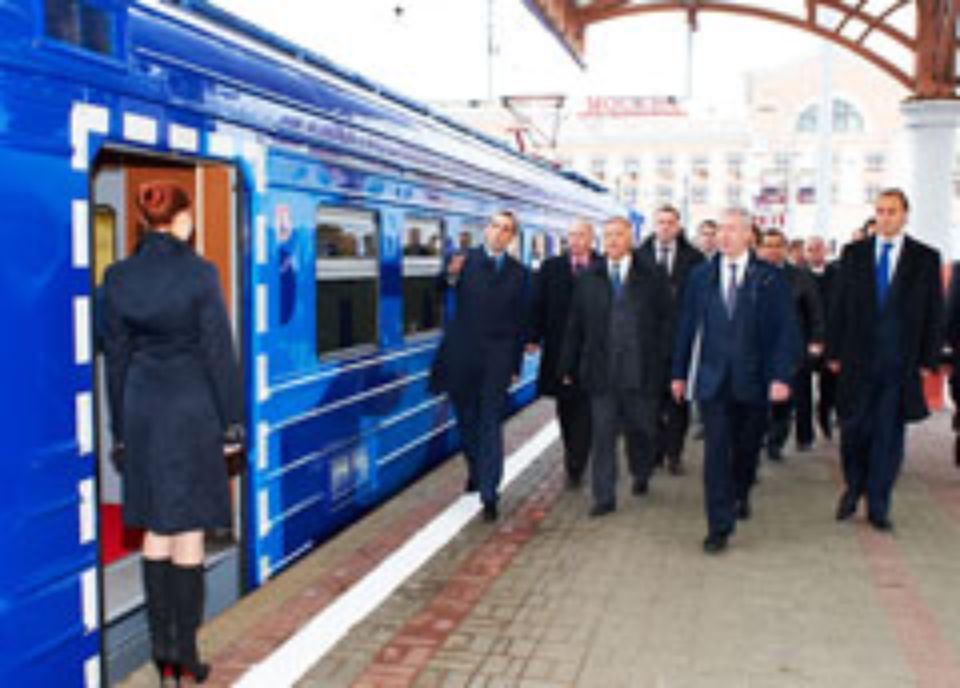 Alexei Krivoruchko shows the new train design to the guests